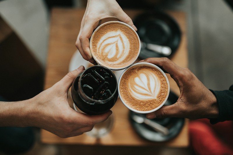 Overhead photograph of three cups of coffee